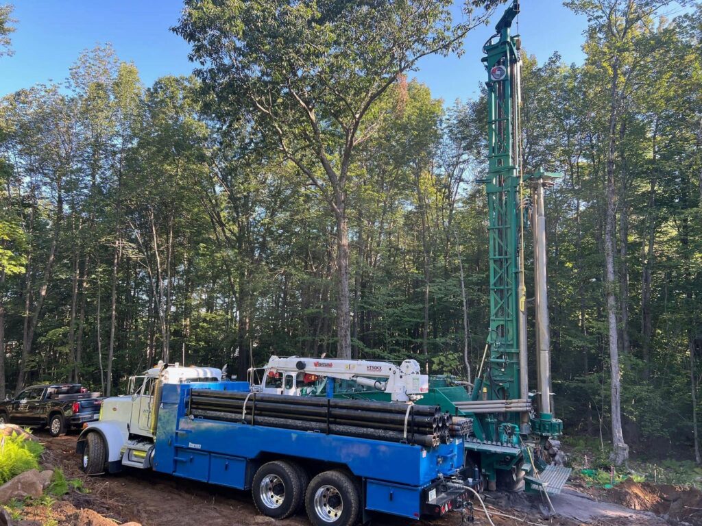 Well-drilling rig working on a rural homesite in North Georgia